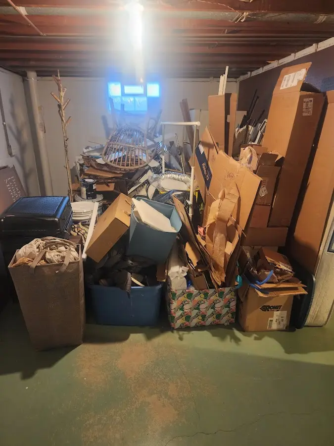 Roll-off dumpster container at job site for Yard Waste Dumpster Rental in University Center